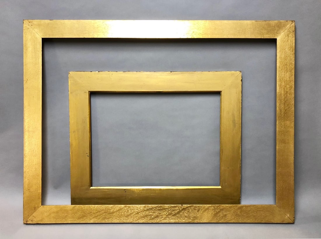 Pair of Carved and Gilt Flat Wood Frames: Pair of Carved and Gilt Flat Wood Frames.One Foster Brothers, label on verso. Rabbet Sizes: 22.5 x 31.5 / 14 x 19 in. Overall Framed Sizes: 27 x 35.75 / 19 1/8 x 24 in.
