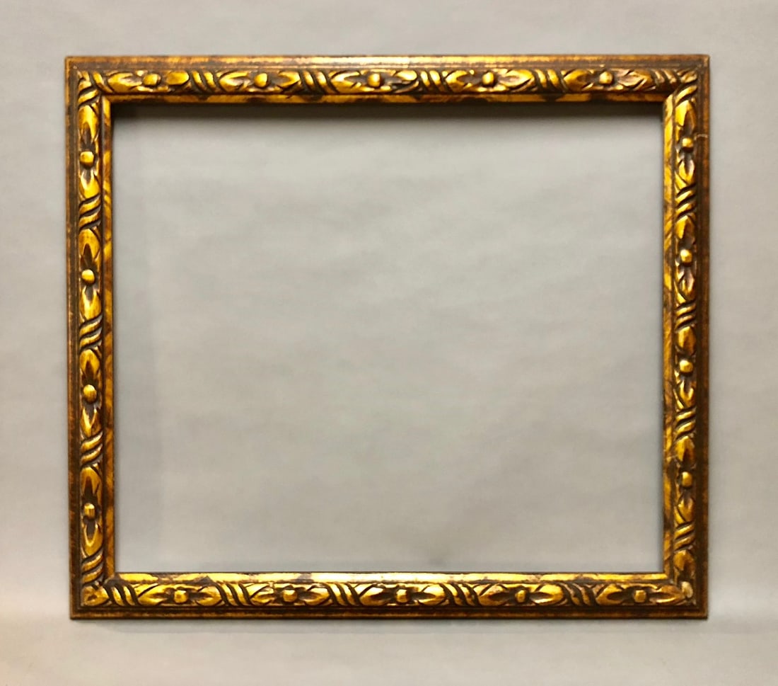 20th Century Carved Gilt Wood Frame: 20th Century Carved Gilt Wood Frame. Rabbet Size: 20.5 x 24 in. Overall Framed Size: 24.75 x 27.75 in.