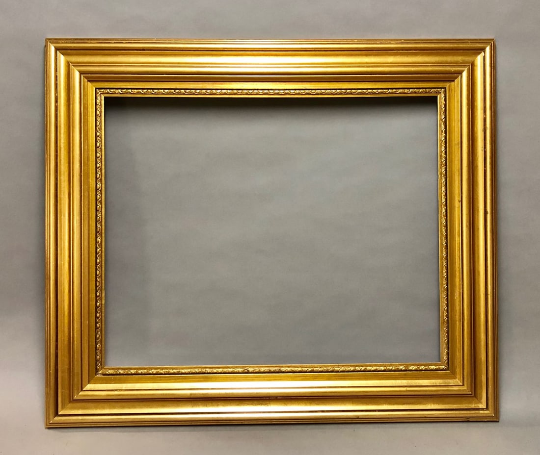 20th Century Carved Gilt Wood Frame: 20th Century Carved Gilt Wood Frame. Rabbet Size: 19 x 23.5 in. Overall Framed Size: 26.5 x 30.75 in.