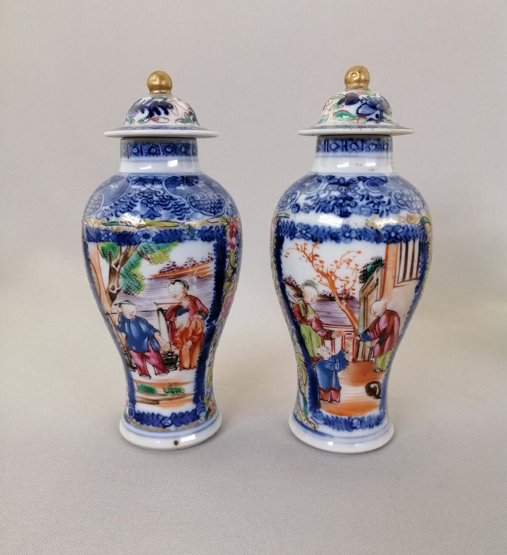 PAIR CHINESE QIAN LONG FAMILLE ROSE LIDDED VASES. (1 of 12)
