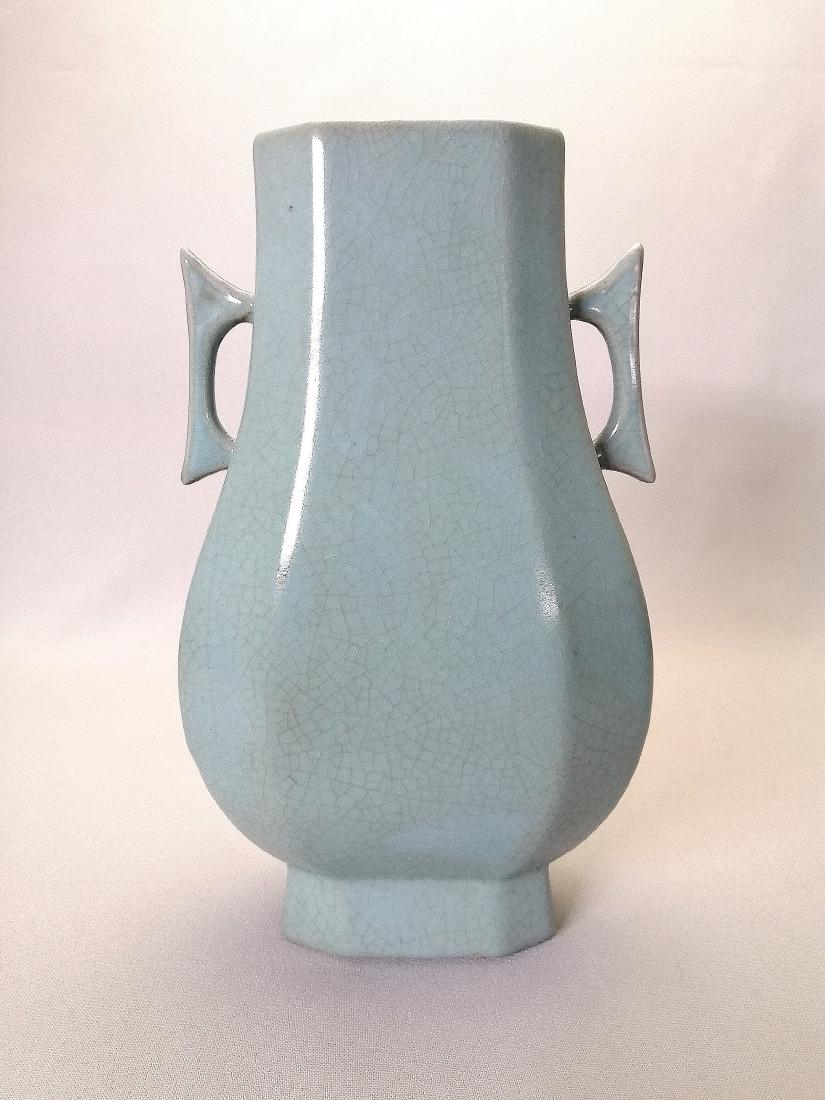 A superb Chinese Ru kiln hexagonal vase: A superb Chinese Ru kiln hexagonal vase with crackle enamel and double ears. A square seal with nine Chinese characters at the central base. The base rim with four branches of the nails, from which yo