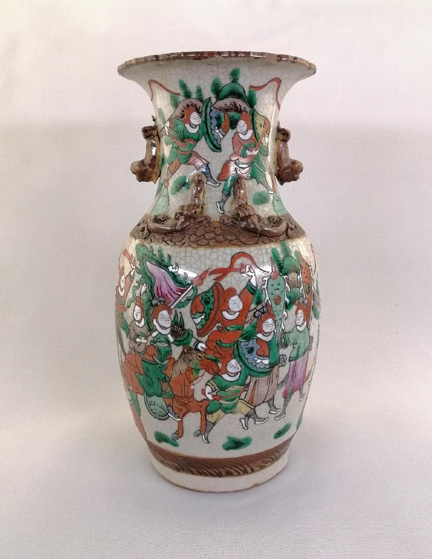 A large elegant Chinese Qing dynasty Ge-style crae: A large elegant Chinese Qing dynasty Ge-style crackle bottle vase decorated with horses and warriors. A central brown square with incised four Chinese characters Cheng Hua Nian Zhi on the base. MEASUR