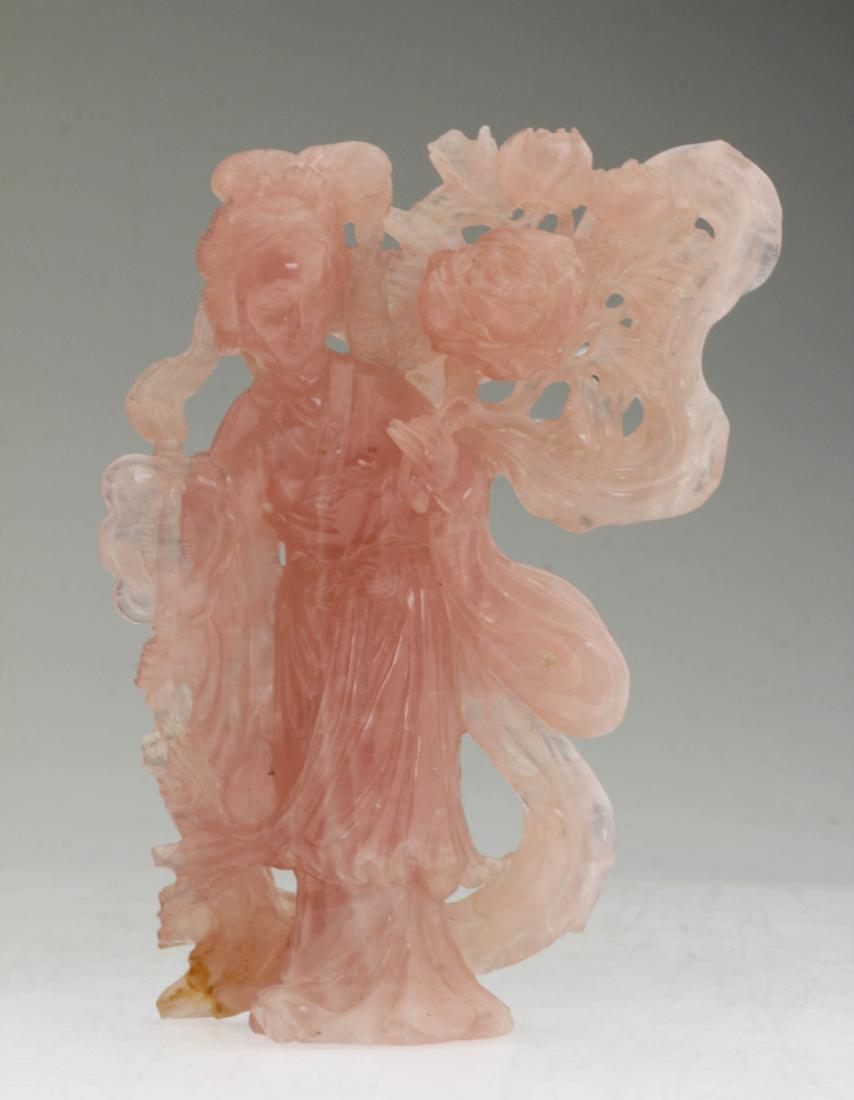 A Chinese rose quatz carved lady holding flowers (1 of 5)