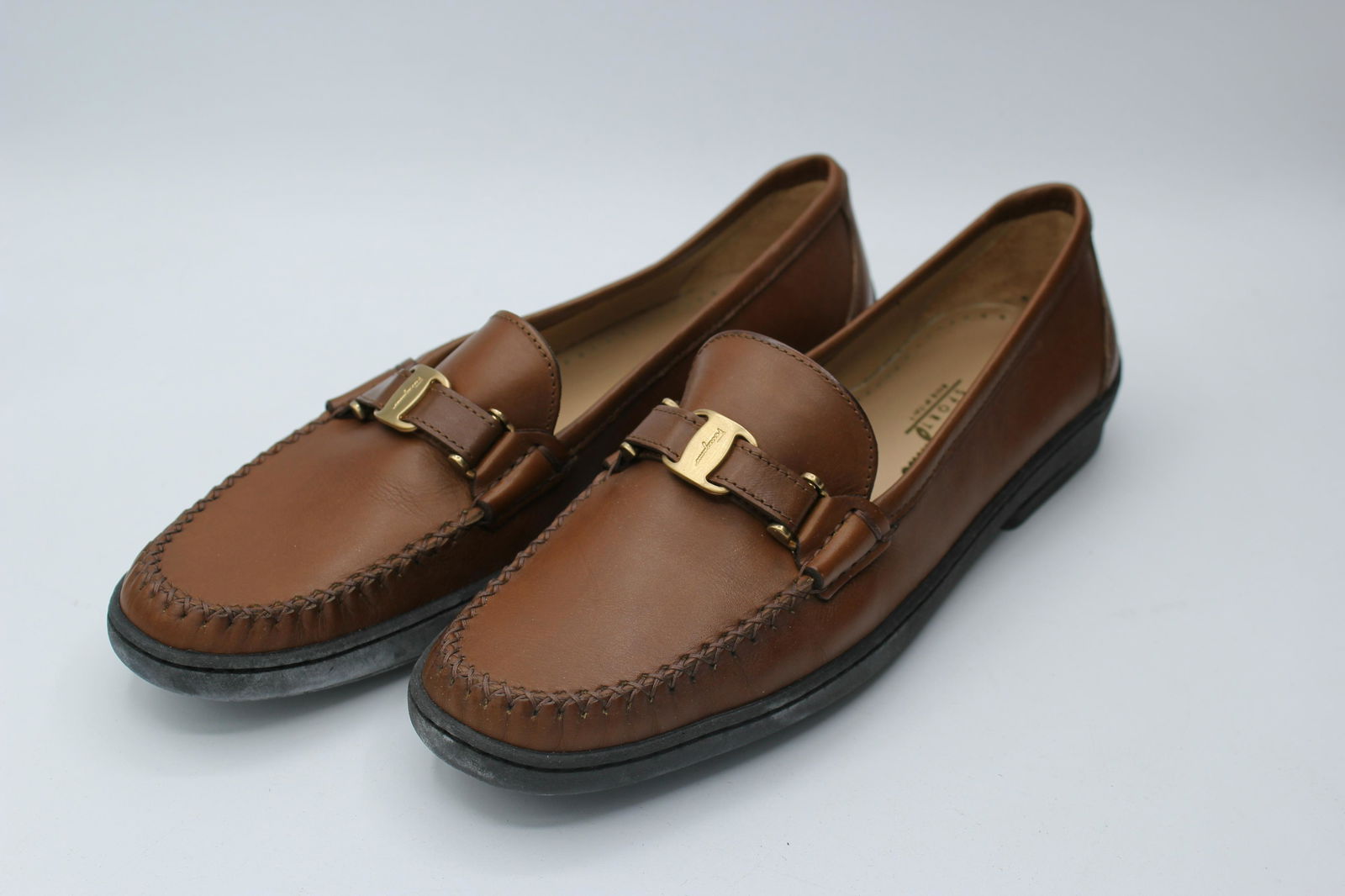 Vintage Salvatore Ferragamo Monza Sigaro Calf: Brown leather slip on with gold buckle and 1cm heel. Size 9.5B. Made in Italy