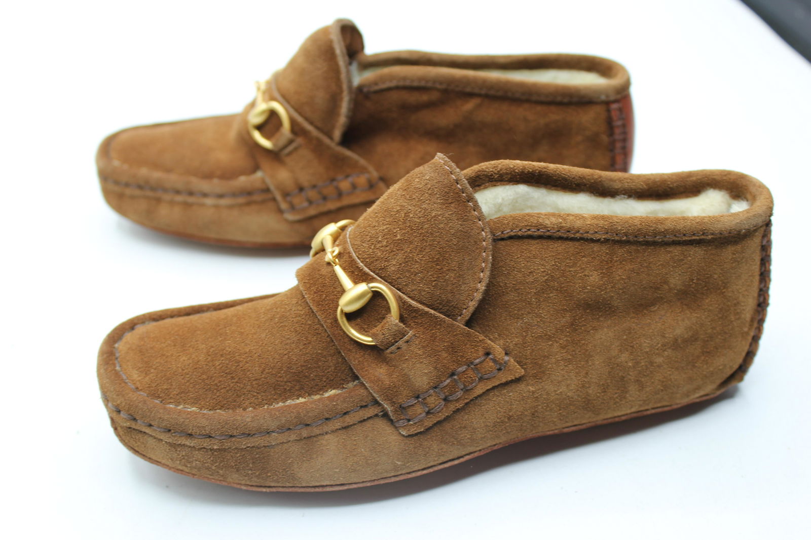 Gucci Leather Fur Lined Slippers: Size 2.5. Comes with box.