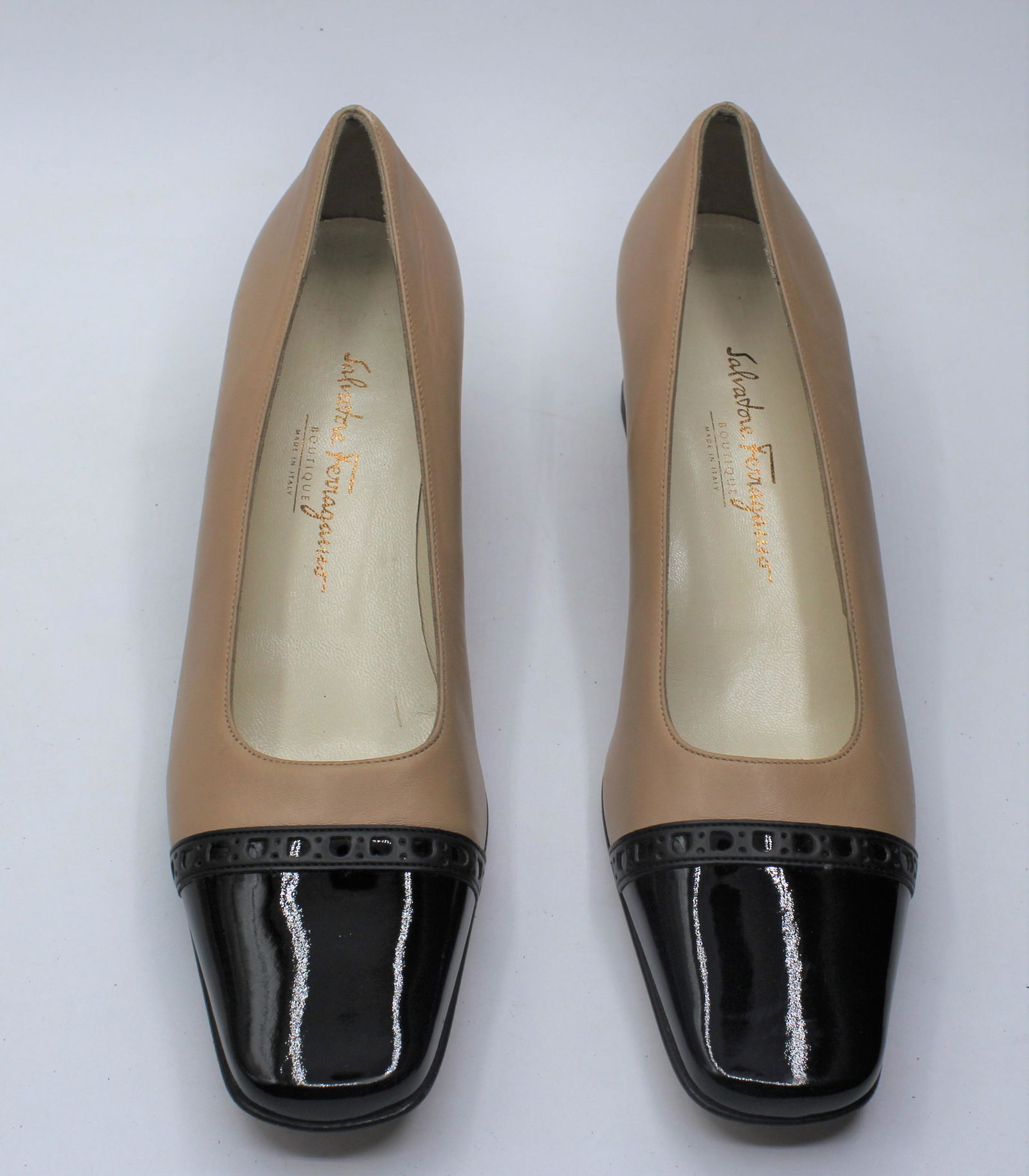 Salvatore Ferragamo Women's Pumps: Brown leather w/ black toe, size 10.