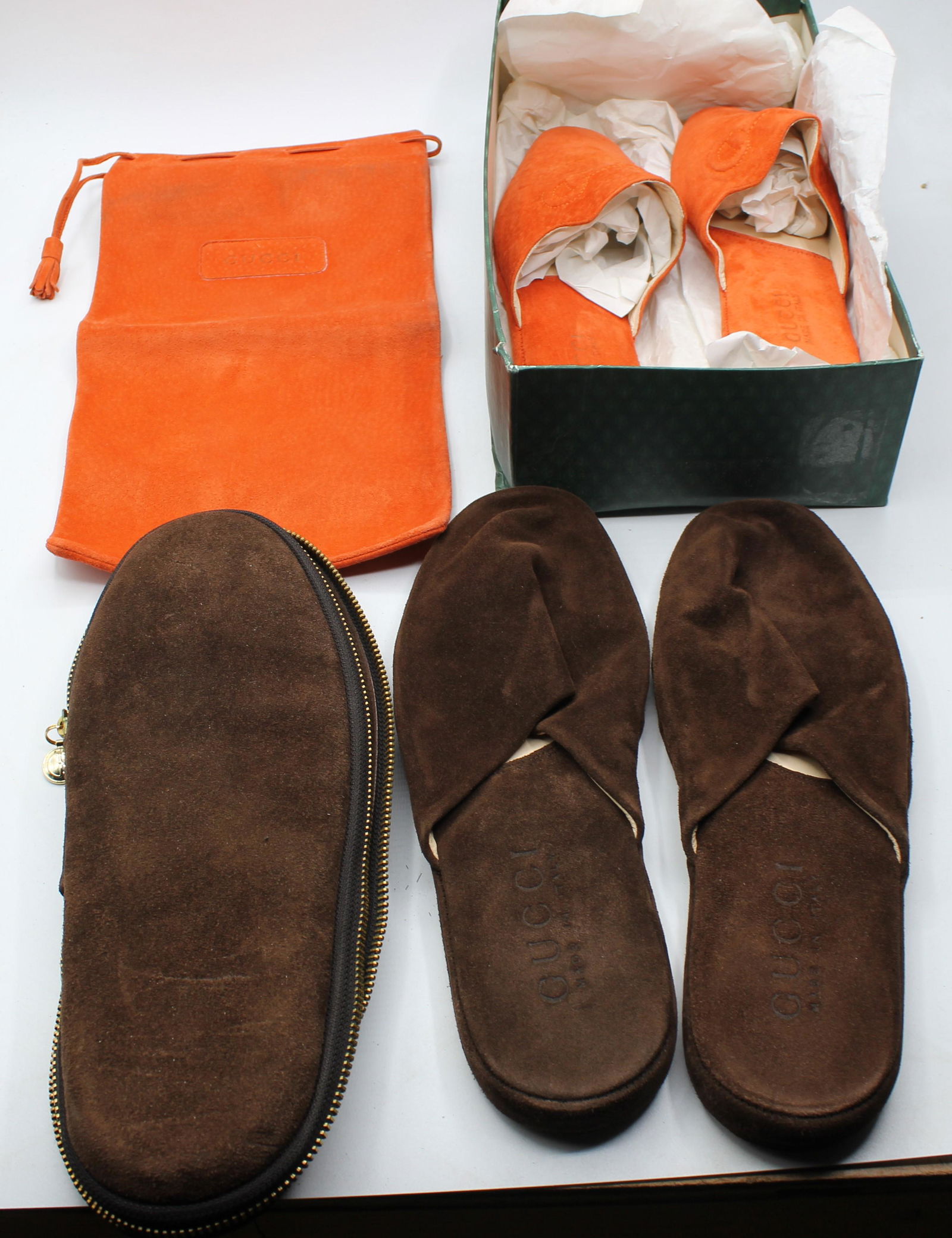 Pair of Gucci Women's Slippers: Brown and Orange, both size 7 and in great shape.