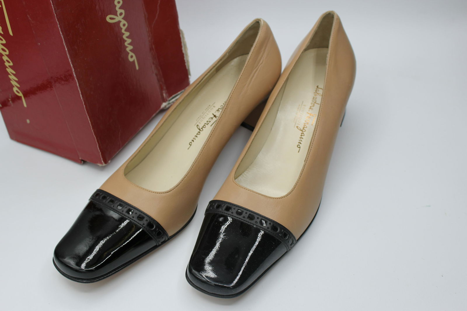 Salvatore Ferragamo Nero Calf Transparant Synthetic: Nero calf transparant synthetic-brown high heels with black toe-size 7.5 B.