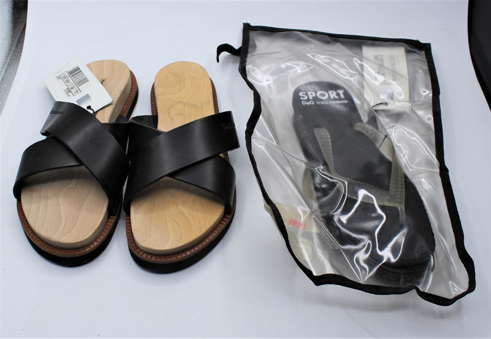 2 Pairs of Dolce & Gabana Designer Sandals: D&G wood, leather and rubber. Both are size 37.