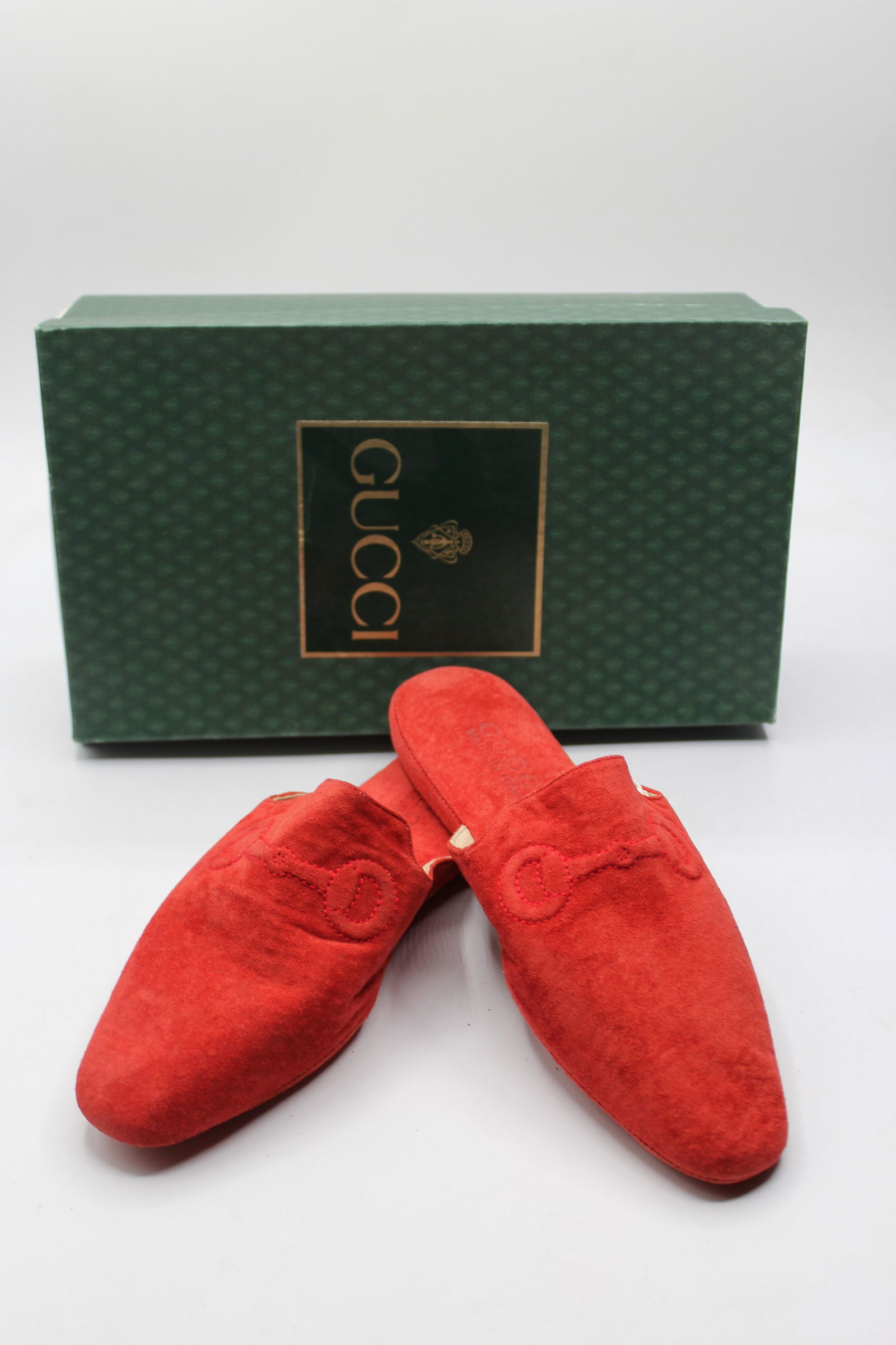 Vintage Gucci Women's Slides: Red leather slides with decorative stitching. Shoes are extremely cozy with butter soft leather interior. Size 6. Made in Italy.