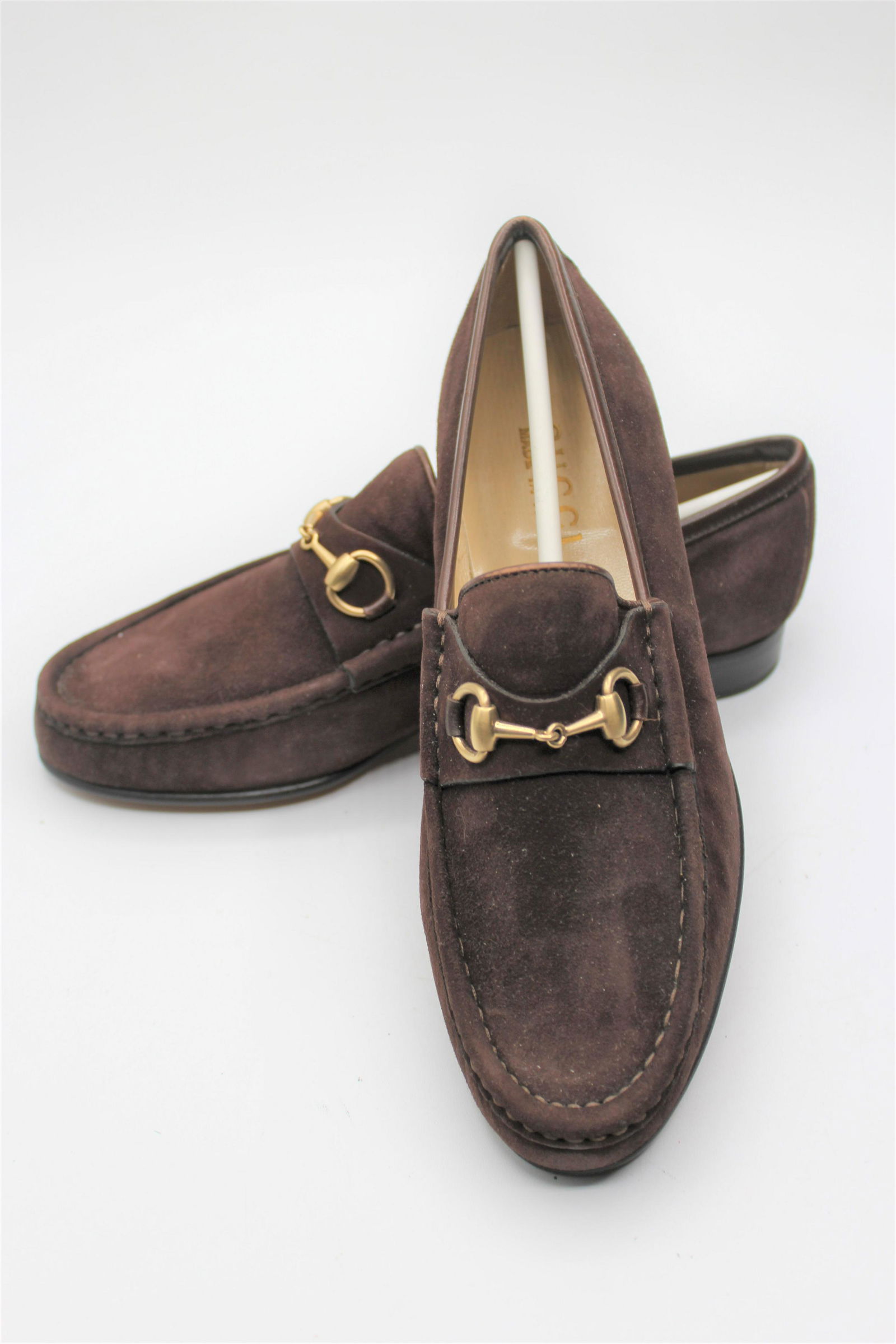 Classy Gucci Women's Leather Loafers: Brown suede loafers with gold chain accent. Perfect work staple! Size 6.5 Made in Italy.