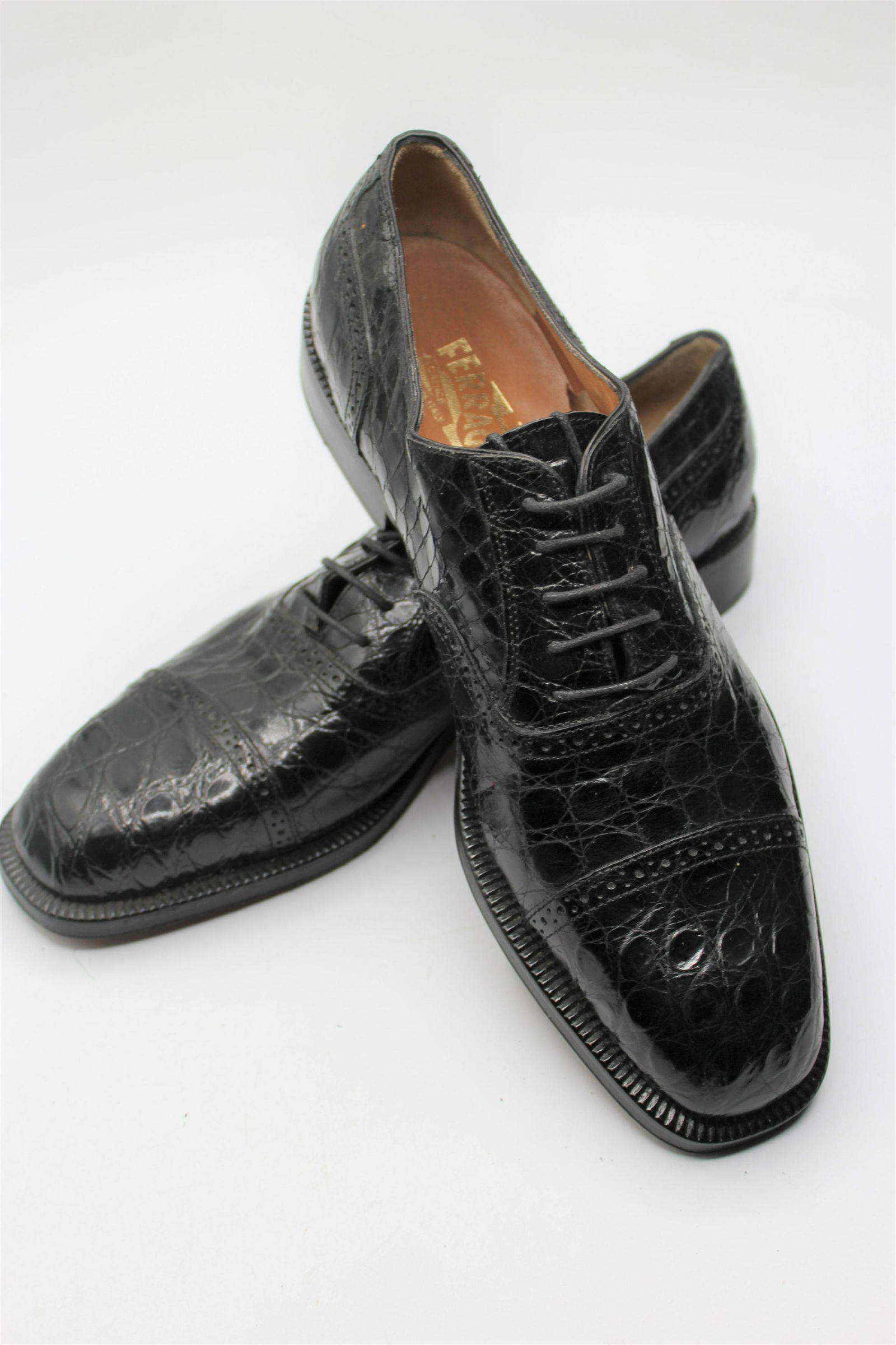 Salvatore Ferragamo Men's Dress Shoes: Stylish, men's black, leather dress shoes with textured print! Perfect for the office or a night out. Lace up front. Size 9.5.