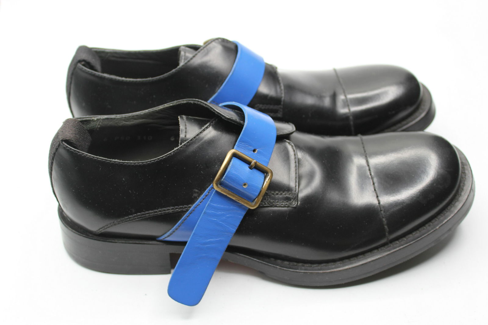 MIU MIU Men's Shoes: Super stylish, men's, black leather dress shoes with blue accent! These are a beautiful statement piece. Perfect for the office or a night out! Size 6.5. Made in Italy.
