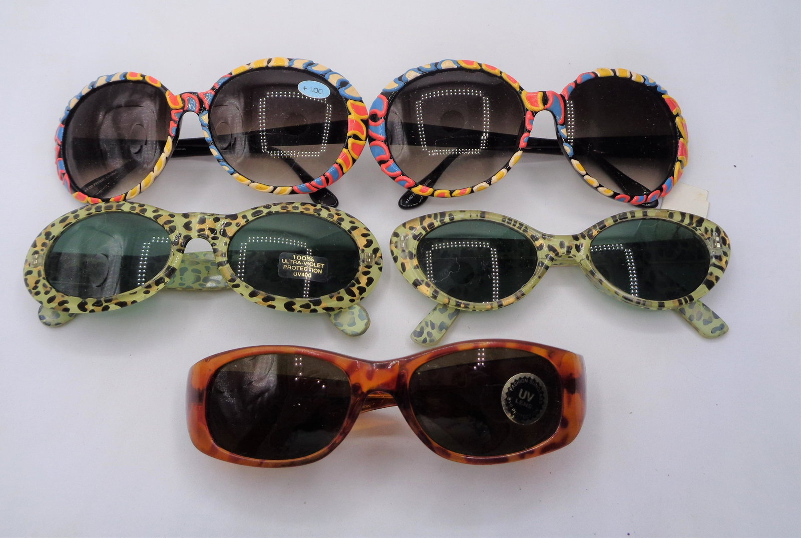 Lot of 5 Sunglasses: Includes 2 Milano glasses. These glasses do have flaws and will need some TLC - some scratches, on lenses and frames. Have been in storage for over two decades.