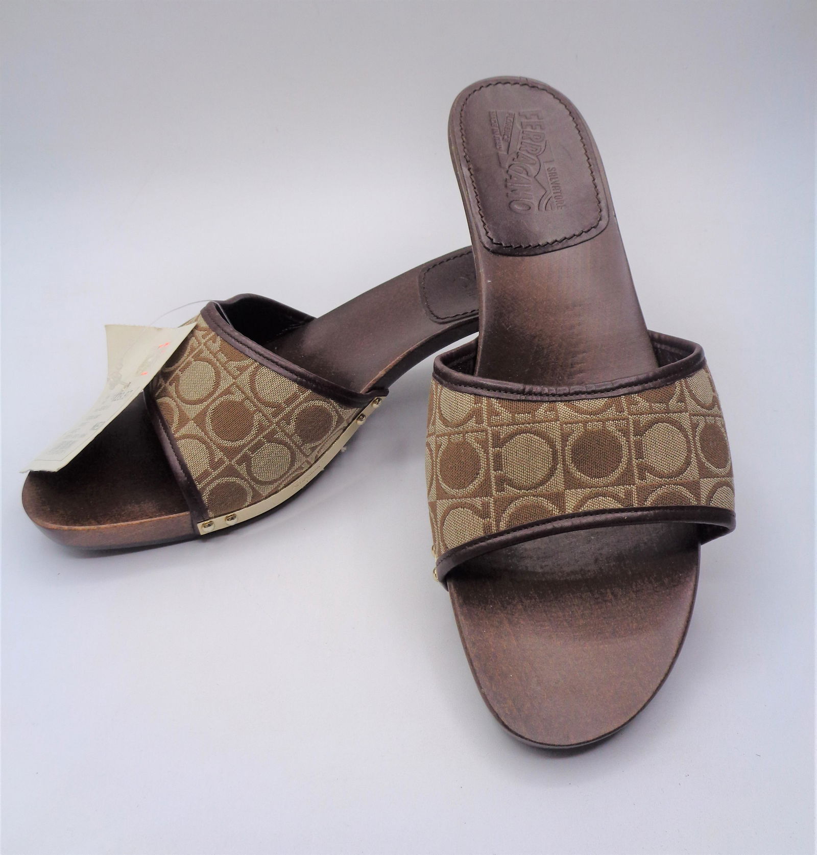 Salvatore Ferragamo Wooden Sandals: Size 8.5. Wooden soles, gold accents, leather & canvas band. Original price $240.00.
