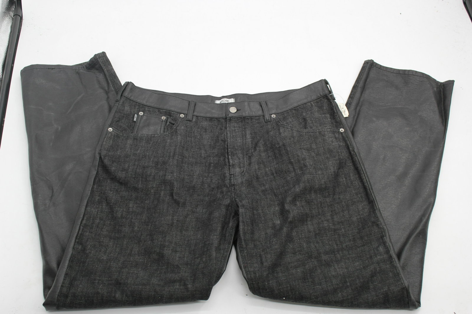 Moschino Peace Sign Pants: Super chic. mix material Moschino pants! This items combines Leather and denim to create a truly unique set of jeans! Size 42.
