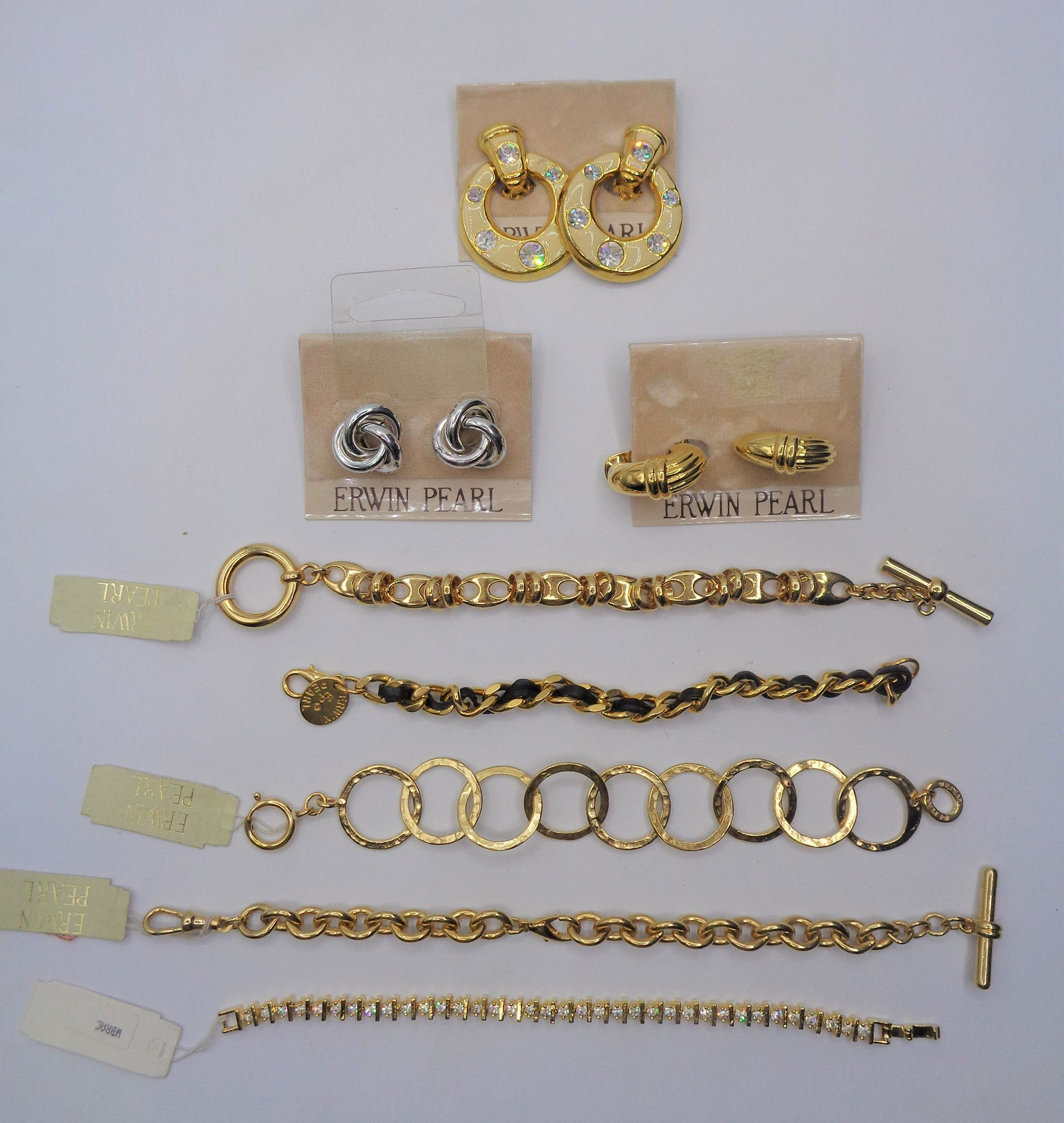 Erwin Pearl Mixed Jewelry Lot: This lot is for 8 pieces total. Includes silver and gold covered metal. 5 bracelets and 3 earings.