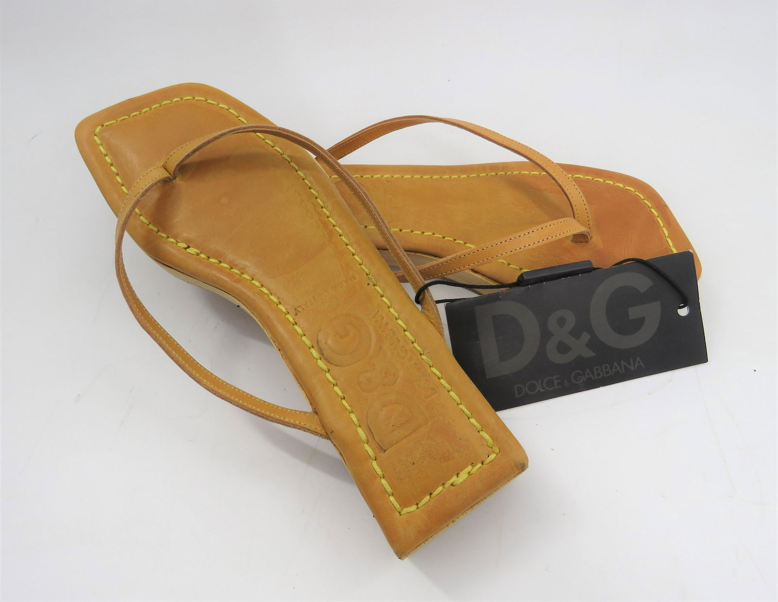 Dolce & Gabbana Tan Sandals: Tan thong sandals, size 37.