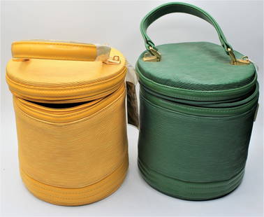 Melange Carrying Cases: Stylish green and yellow round carry ons. Made in Italy.