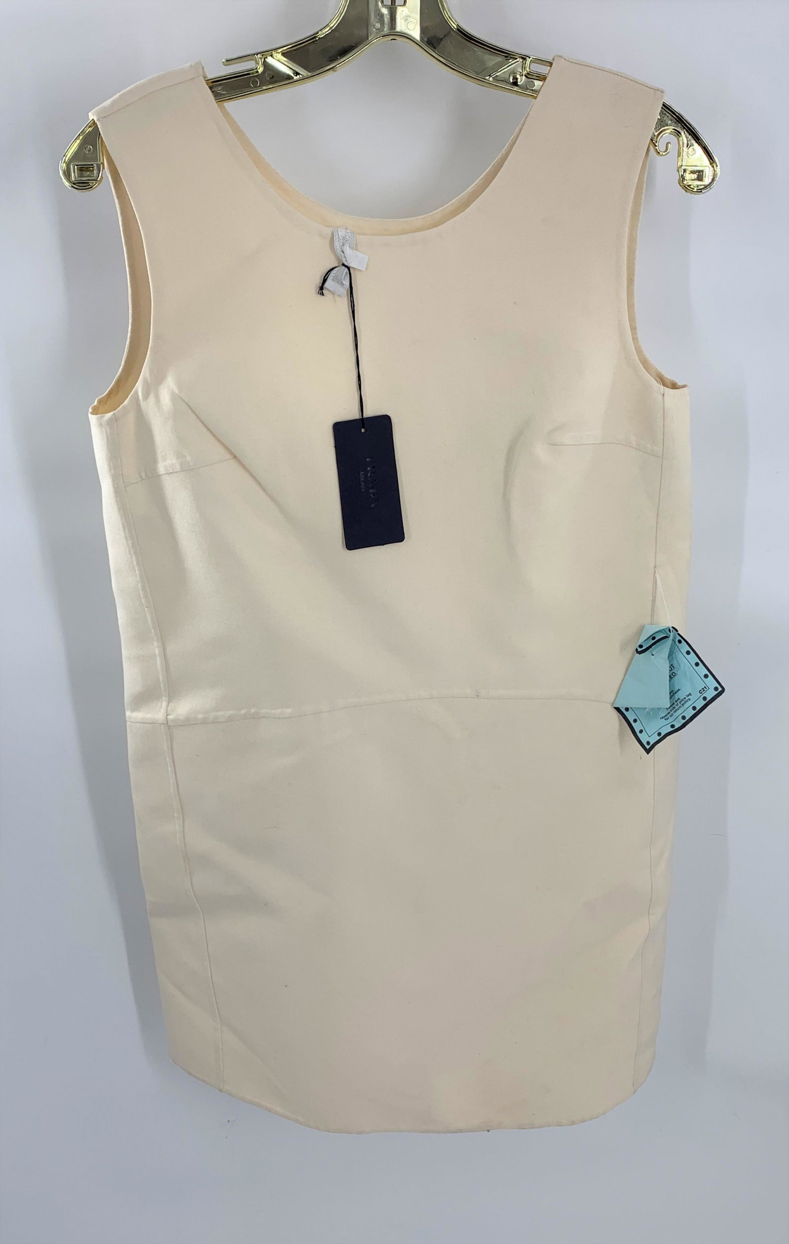 Prada Shell Cream Shell Dress: Classic, cream, silk & wool blended sleaveless dress. Perfect for layering. Size 42.