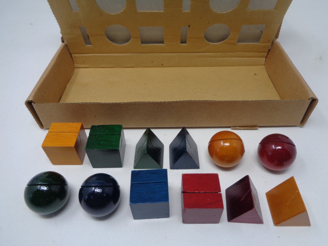 Museum Of Modern Art Place Card Holders Lot: Set of 3 "Museum of Modern Art" colored wood place card holders designed by artist Kriss Olsen ! Each box comes with 12 wooden place card holders in different colors and shapes. These are perfect for