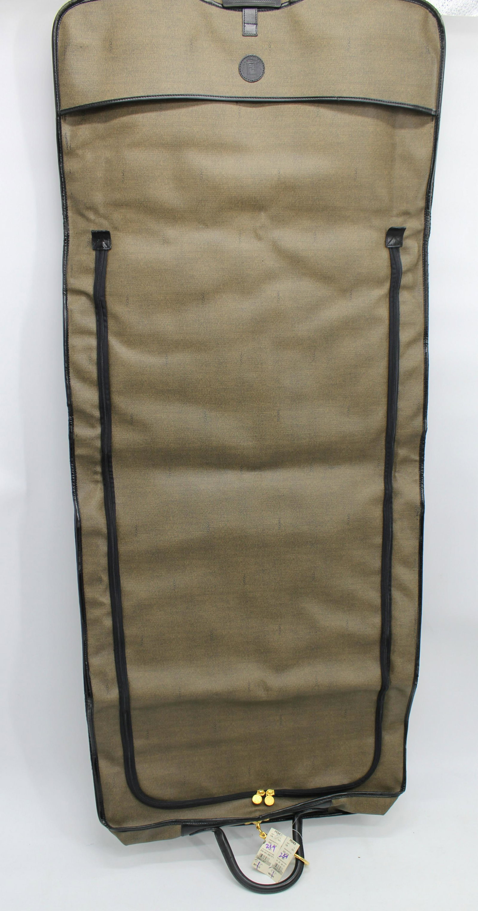 Fendi Garment Bag: Fendi garment bag with gold accents. New with tags. Leather does have some ware throughout. See photos. Original Price $875.