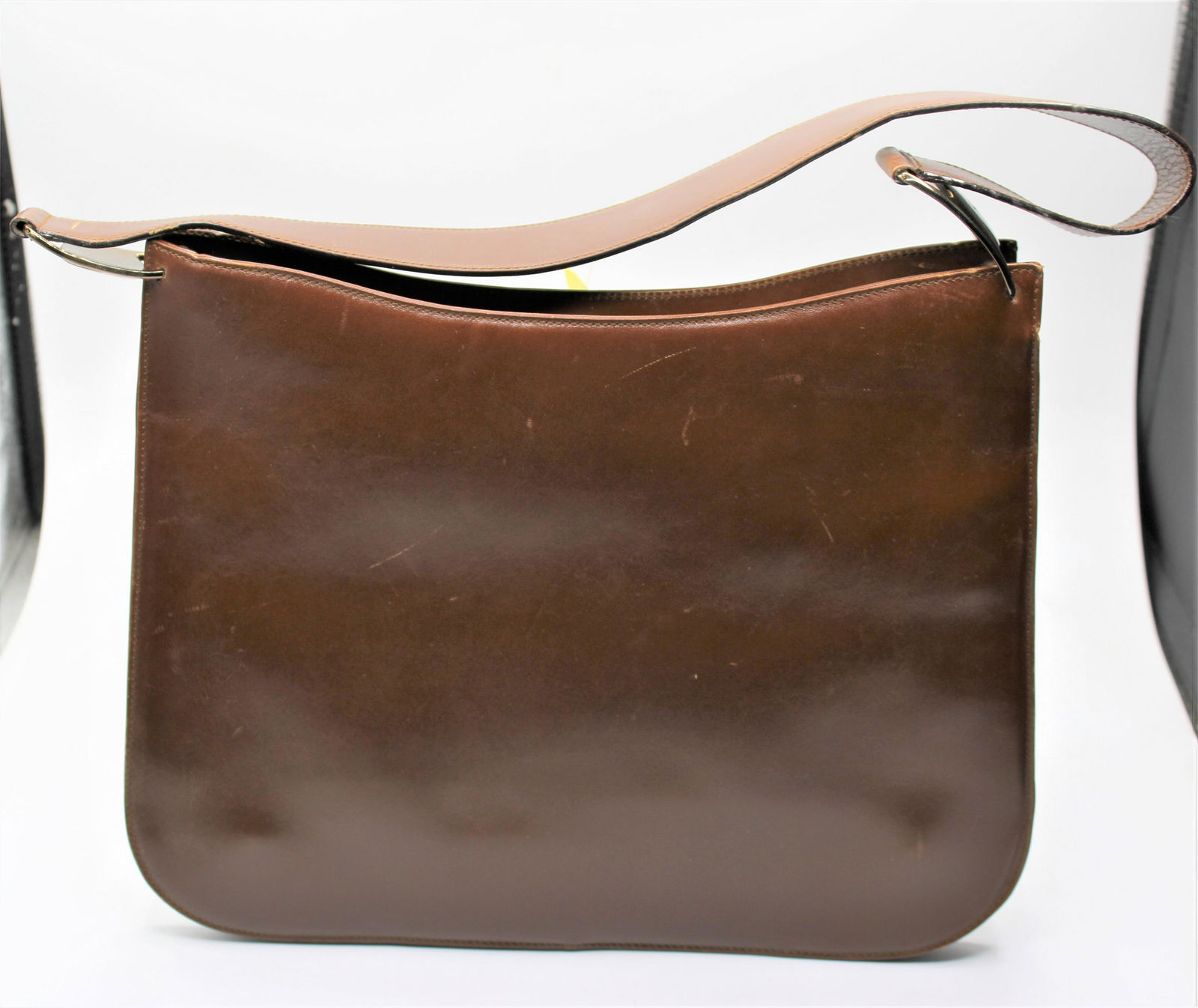 Salvatore Ferragamo Purse: Brown leather, gold & bronze accents. Interior zipper pocket, single strap, snap button. 13x10."