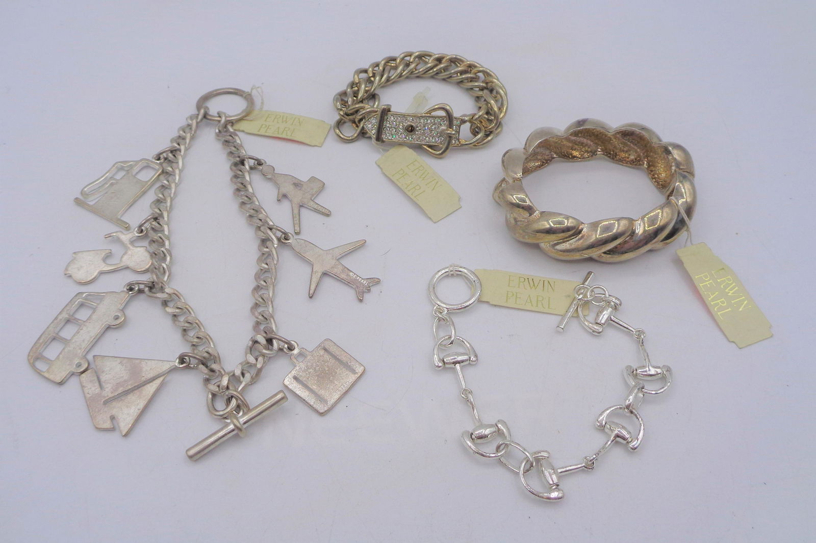 Lot of 4 Erwin Pearl Bracelets: Lot of 4 silver bracelets that can be dressed up or down foe a leisurley or elegant look.