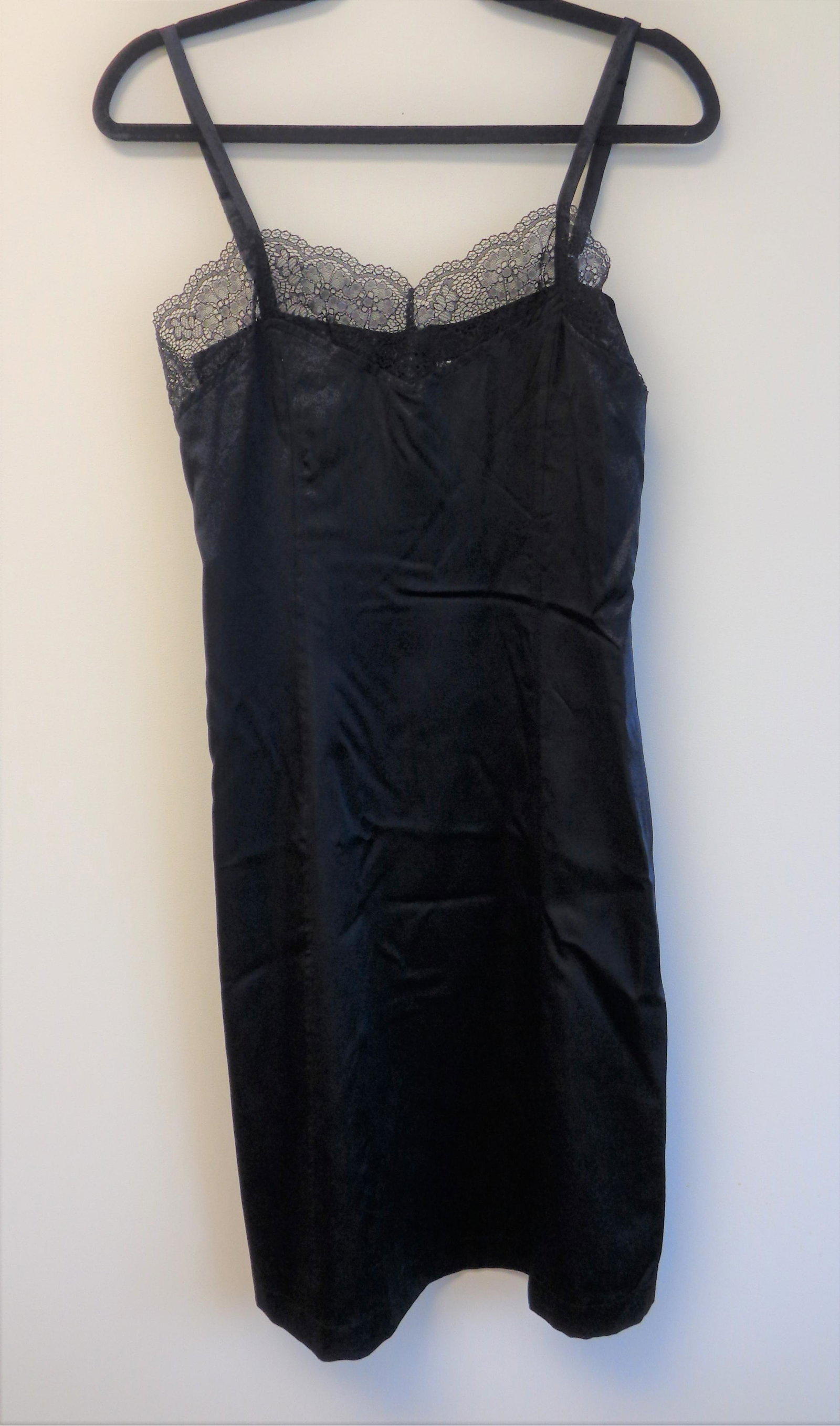 Armani Black Slip Dress: The perfect LBD that's classic Armani. Can be dressed up or used as a base for any office outfit. Women's size 10. Made in Italy. This is a great staple!