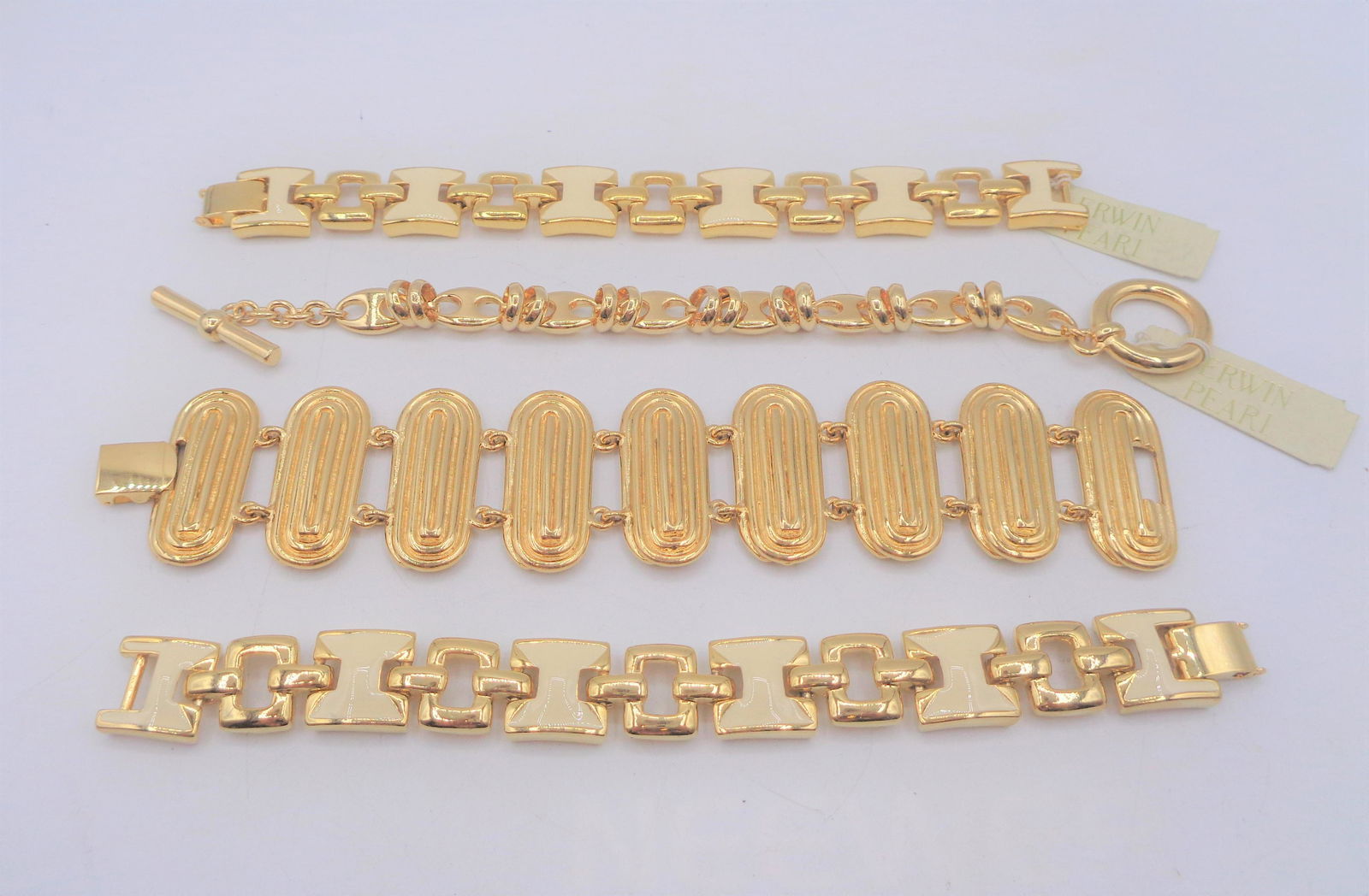 Lot of 4 Erwin Pearl Bracelets: Lot of 5 gold Erwin Pearl bracelets. These are a great staple item for any jewelry collection!