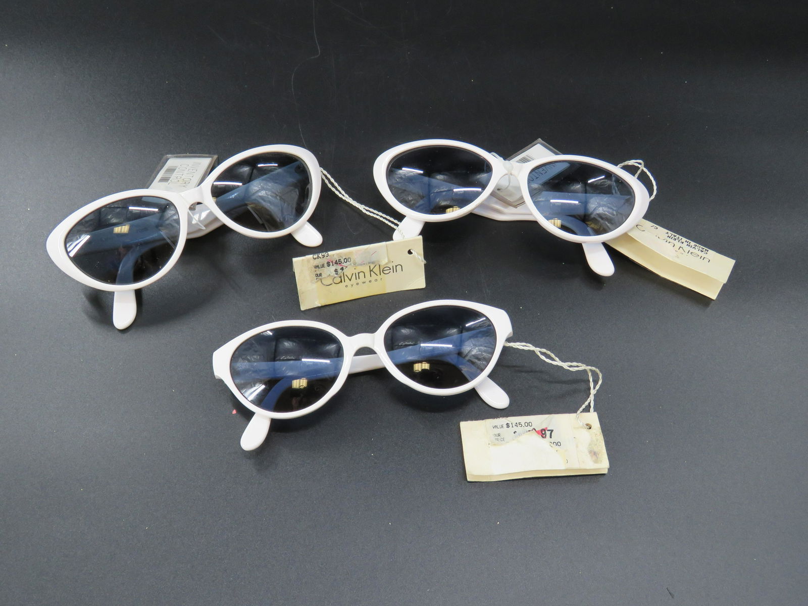 Lot of 3 White Calvin Klein Sunglasses: Hot summer bulk lot! 3 pairs of classic, Calvin Klein glasses in white! Original price $145 each!