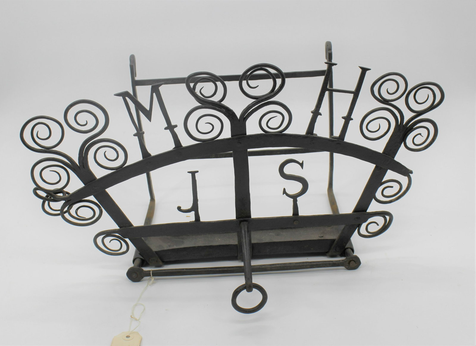 Antique Initialed Log Holder: Initials are MH, JS. Adjustable base, wrought iron. Provenance: Butterfield's Auction. 21x10x12.5.