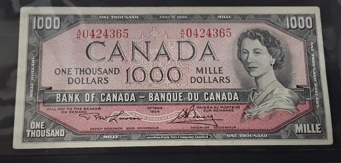 Canadian $1,000 Banknote: This is a 1954 Canada $1,000 Lawson Bouey banknote. This banknote's serial number starts with A/K. Bank note, bills