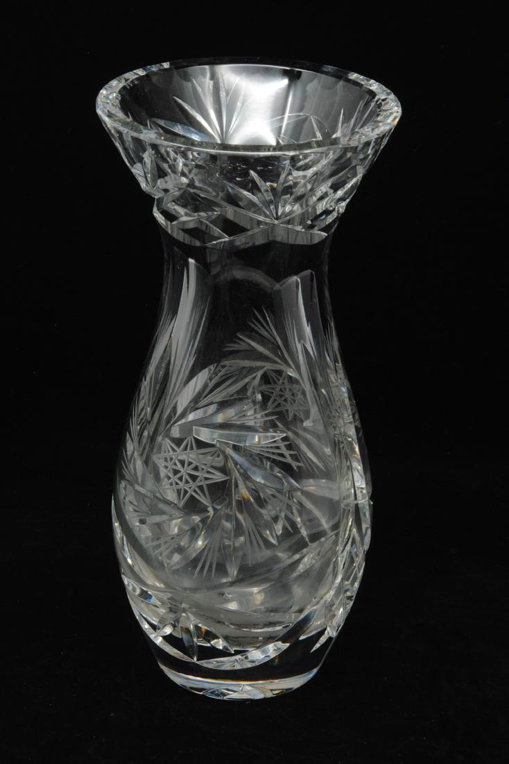 Crystal Vase with Star Pattern: A crystal vase with an intricate and beautiful star pattern. This vase is in excellent condition with no signs or chips, cracks, damage, wear, or repairs. 5" x 5" x 10"