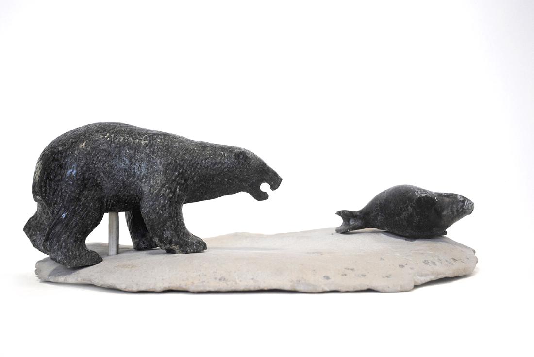 Sam Ogruk's "Bear and Seal" Original Inuit Carving: Sam Ogruk's "Bear and Seal" original Inuit carving. Carved in 1900, from the community of Taloyoak. 11 1/2" x 7 1/2" x 4"