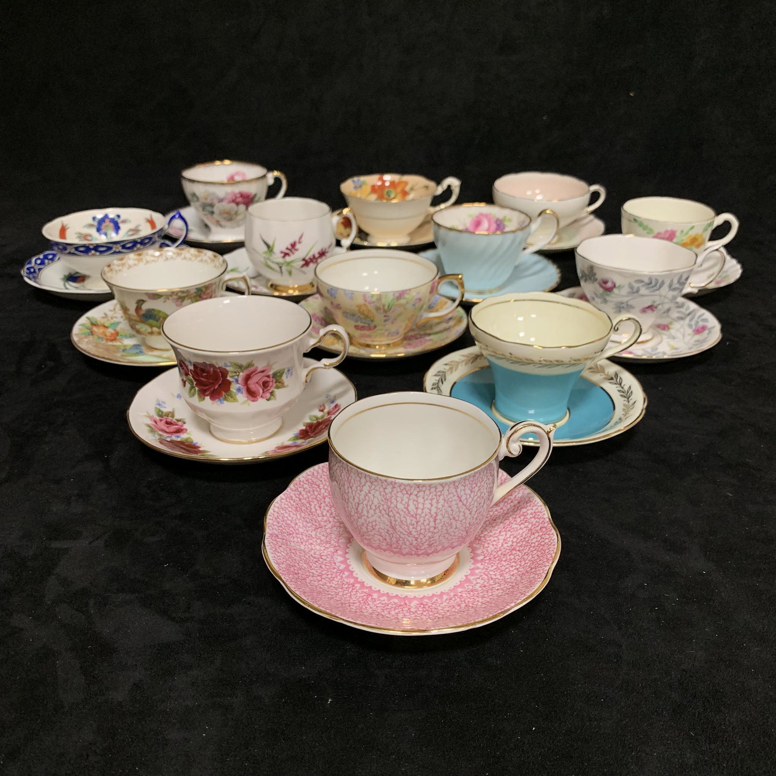 13 Matching Tea Cups and Saucers: A collection of 13 matching tea cups and saucers. Makers include- EB & Co. "Foley China", Bell, Delphine, Paragon, Royal Vale, Royal Albert "Conway", Aynsley, Sutherland China "Exotic", EB & Co "Foley