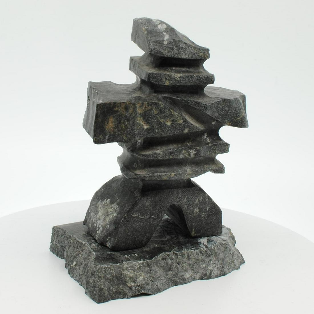 Ernie Porter's "Inukshuk" Original Inuit Carving: Ernie Porter's "Inukshuk" original Inuit carving. Carved in 1992, from the community of Gjoa Haven. Carved fom stone, and certified by the government of Canada. This carving is in excellent condition.