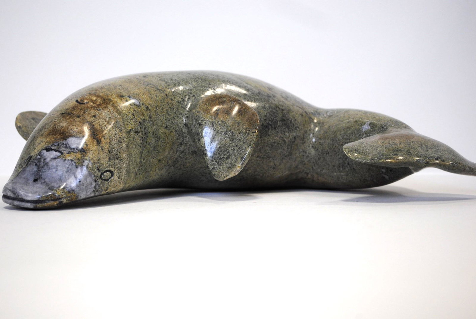 Moe Pootoogoo's "Whale" Sculpture: Moe Pootoogoo's "Whale" original Inuit carving. Carved in 2018, from the community of Cape Dorset. 14" x 9" x 4"14" x 9" x 4"
