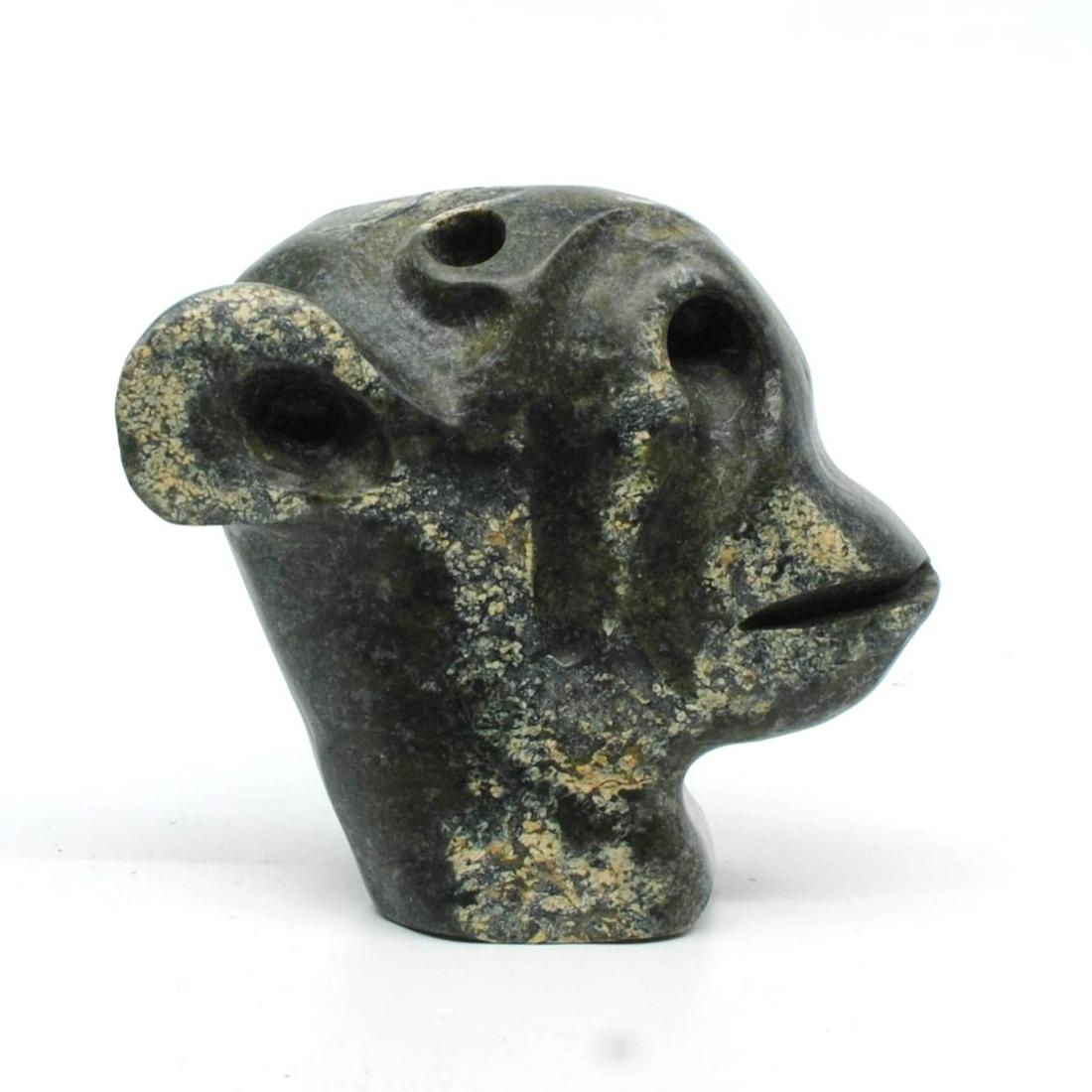 Leo Uttaq's "Bear Spirit" Original Inuit Carving: Leo Uttaq's "Bear Spirit" original Inuit carving. Carved in 1990, from the community of Taloyoak. Carved fom stone, and certified by the government of Canada. This carving is in excellent condition. I