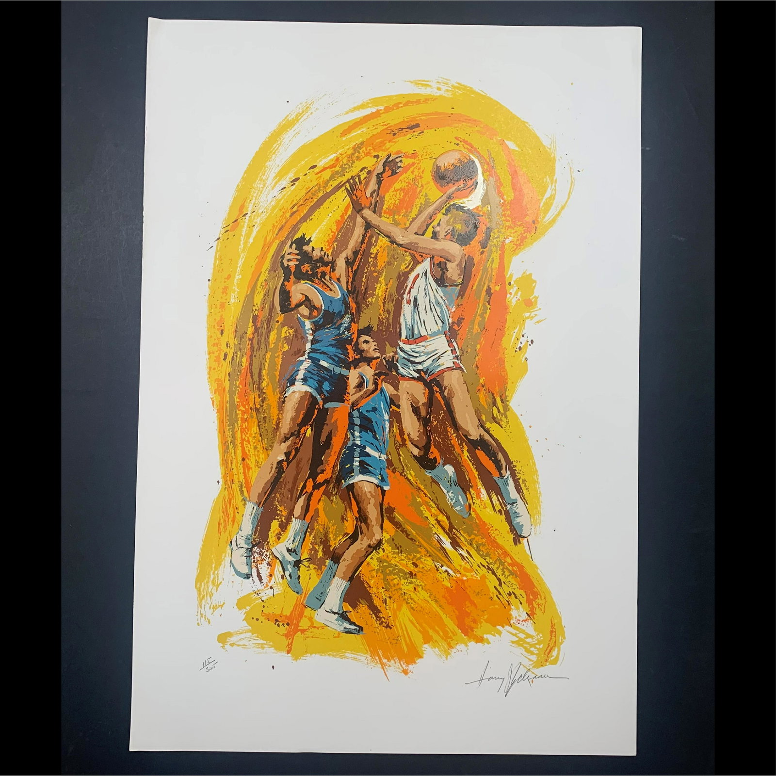 Harry Schaare's "Basketball" Limited Edition Print: Harry Schaare's "Basketball" limited edition print, signed lower right, and numbered 113/325 lower left. This piece is an action shot of three basketball players, in a colourful style. This piece is i