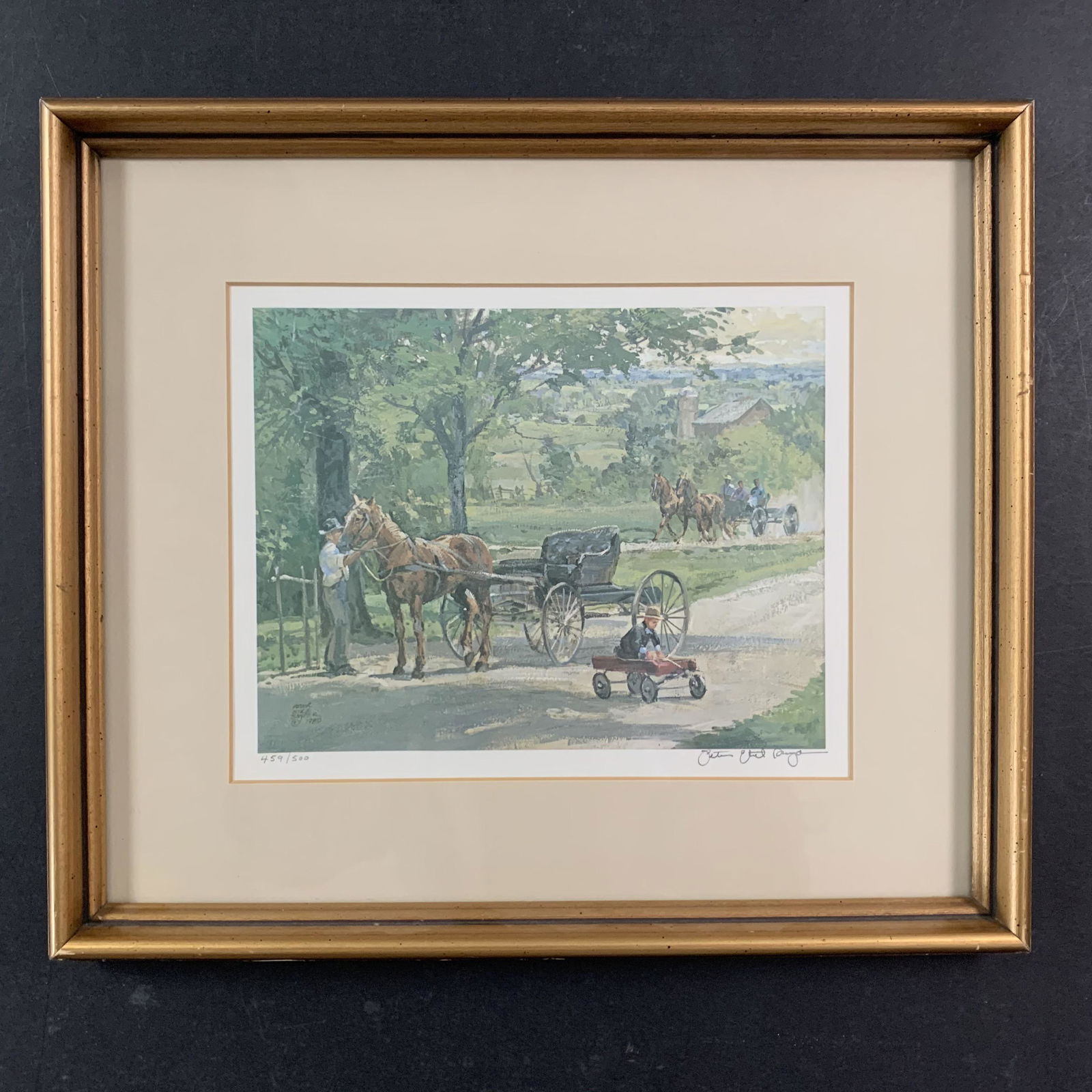 Peter Snyder's "Red Wagon" Limited Edition Print: Peter Snyder's "Red Wagon" limited edition print, signed lower right and numbered 459/500 lower left. This piece is of a young boy inside a little red wagon, with an older man (presumably his father)