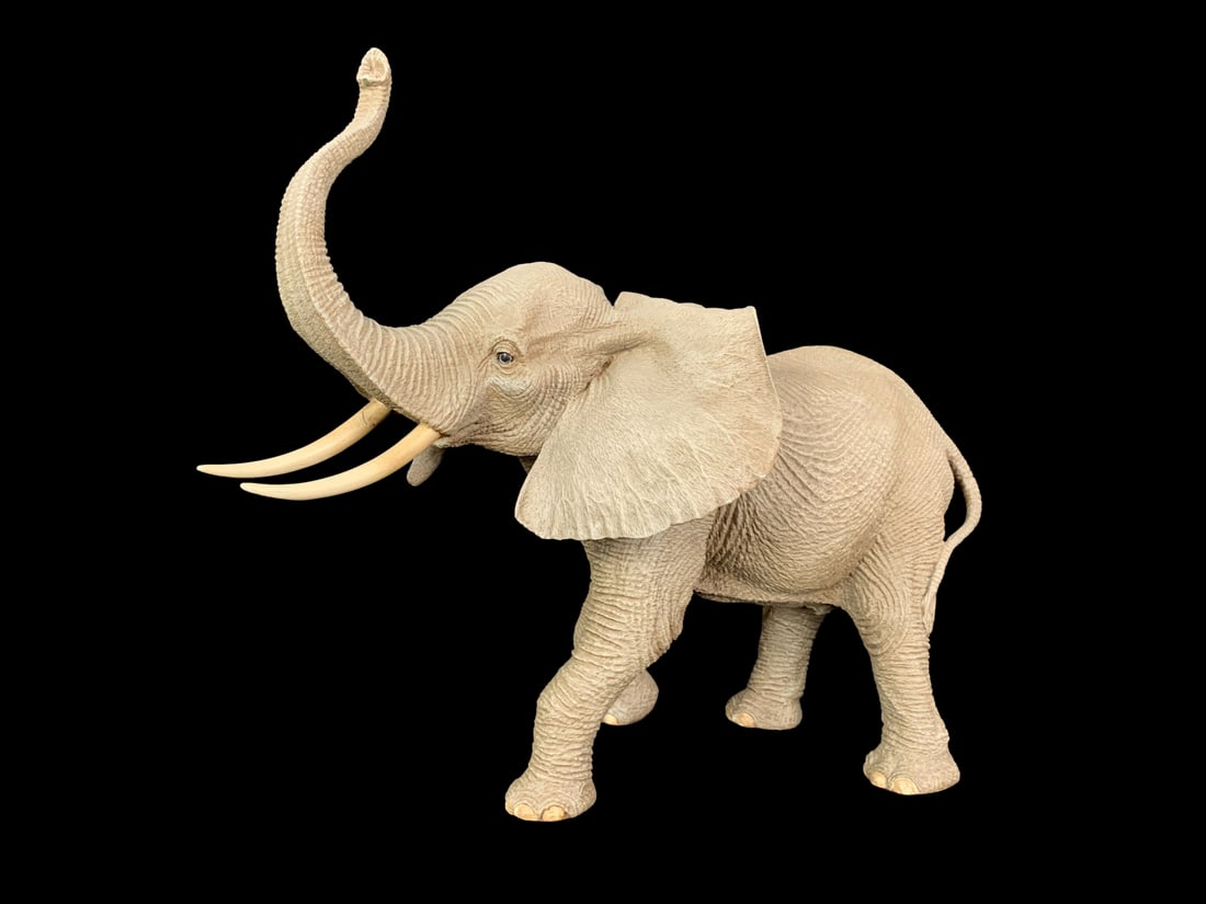 CreArt "Elephant" Sculpture: CreArt "Elephant" sculpture. This piece is of a elephant with its trunk raised. It is in near excellent condition with one crack to one tusk. Theme: Wildlife, Figurine, Vintage, Decorative Collectible