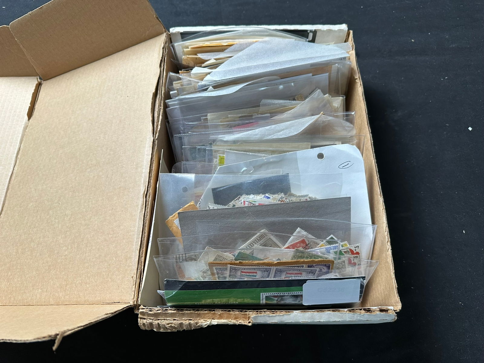 A world used Accumulation in packets contained in a box, (1 of 7)