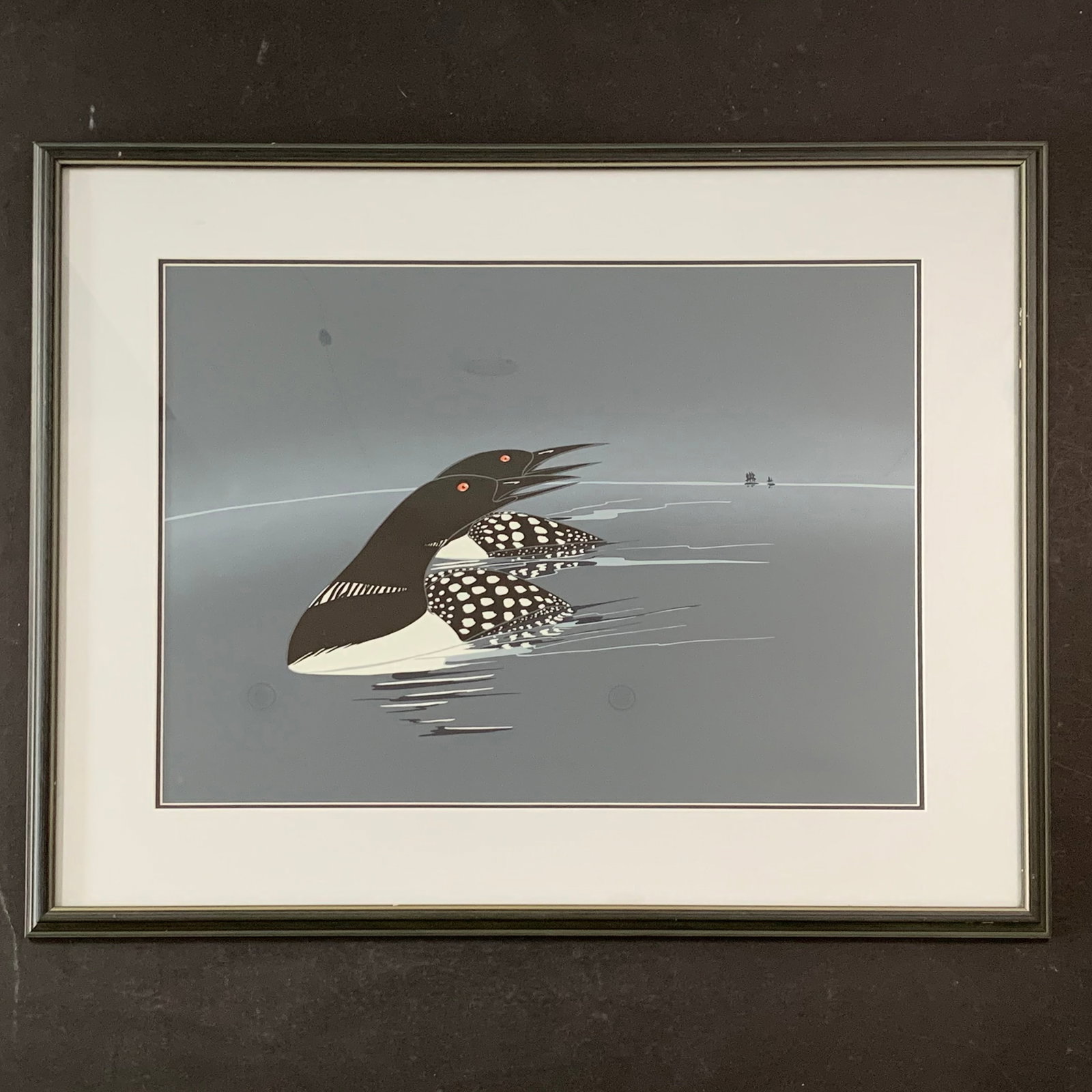 Rick Beaver's "Drifting Echoes" Limited Edition Print: Rick Beaver's "Drifting Echoes" limited edition print, slower right, titled lower middle, and numbered 29/100 lower left. This piece is of two loons swimming in the water, both looking back in the sam