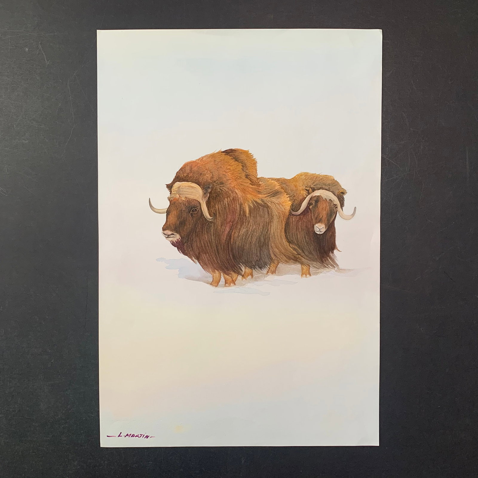 L. Martin's "Bison Pair" Original Print: L. Martin's "Bison Pair" original print. This piece is of two bison standing in the snow, in the middle of winter. This piece is in near excellent condition with a very minor wrinkle at top. Image: 8"
