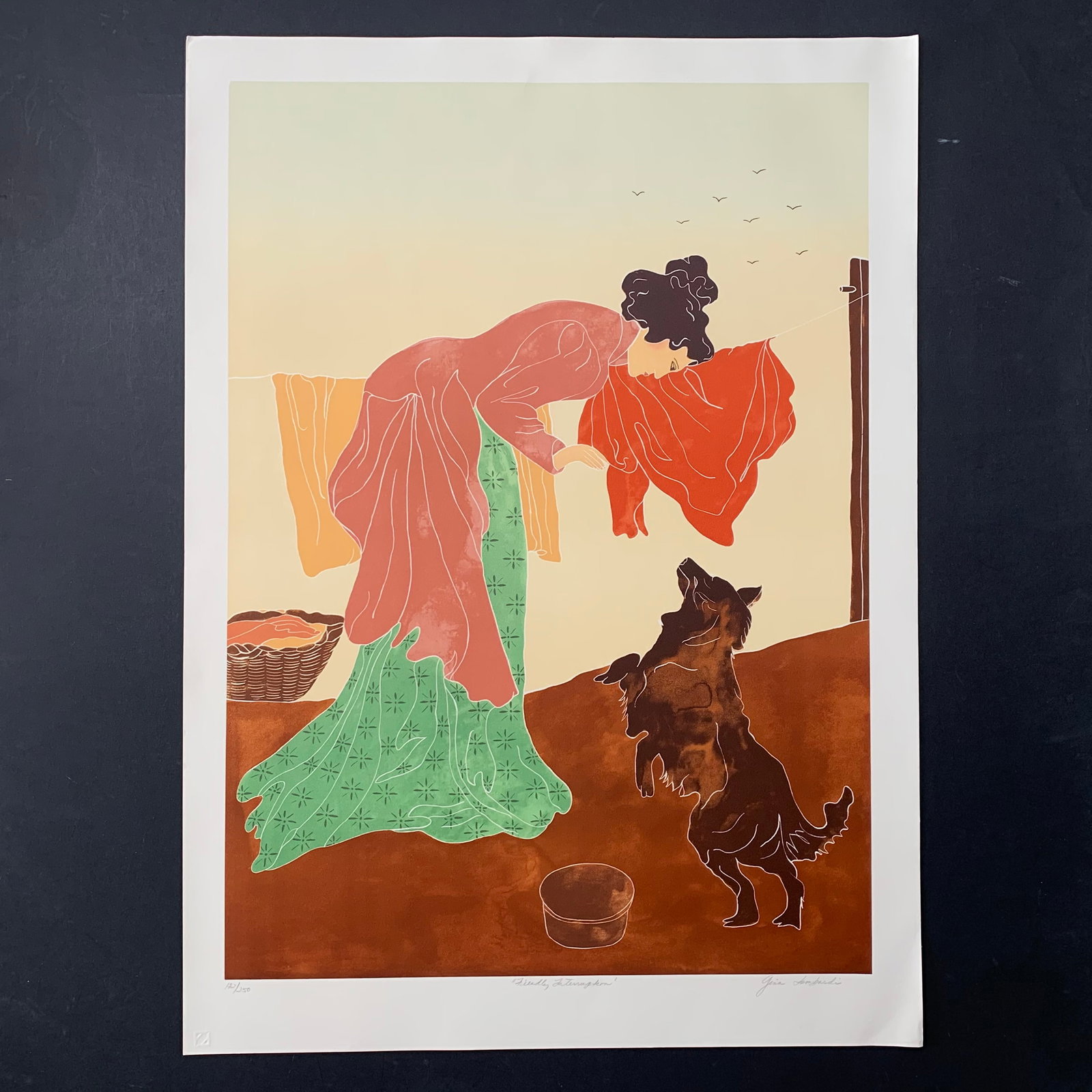 Gina Lombardi's "Friendly Interruption" Limited Edition Print: Gina Lombardi's "Friendly Interruption" limited edition print, signed lower right and numbered 172/250. This piece is of a woman playing with her dog, with clothes drying on a clothesline behind her. 