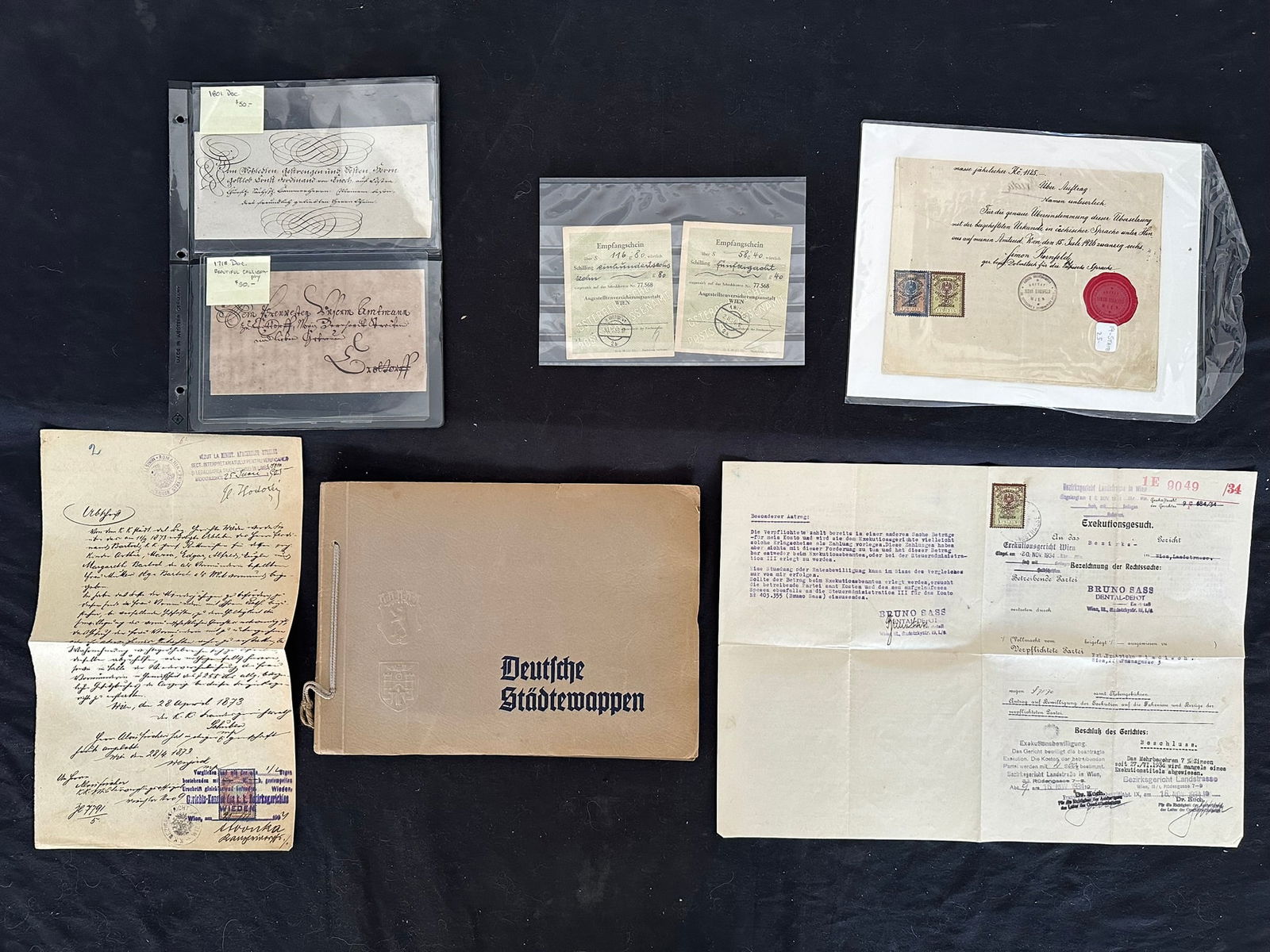 Germany, Ephemera and Revenue collection Est Cat $350.00: Germany, Ephemera and Revenue collection, Est Cat $350.00, Beautiful "Deutfche StadteWappen" album with 103 different City and town Coats of Arms on 1" ( 2.5cm) leather squares, embossed with the Coat