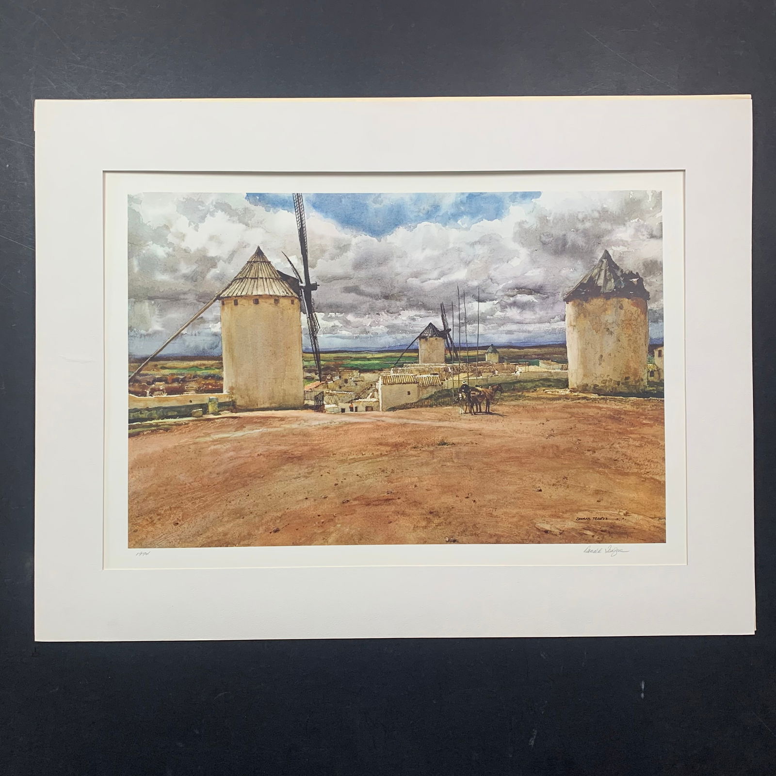 Donald Teague's "Windmills of Don Quixote" Limited Edition Print: Donald Teague's "Windmills of Don Quixote" circa 1974, limited edition print on paper, signed lower right, and dated lower left, from the Franklin Mint. This piece is of a man with his horses, in betw