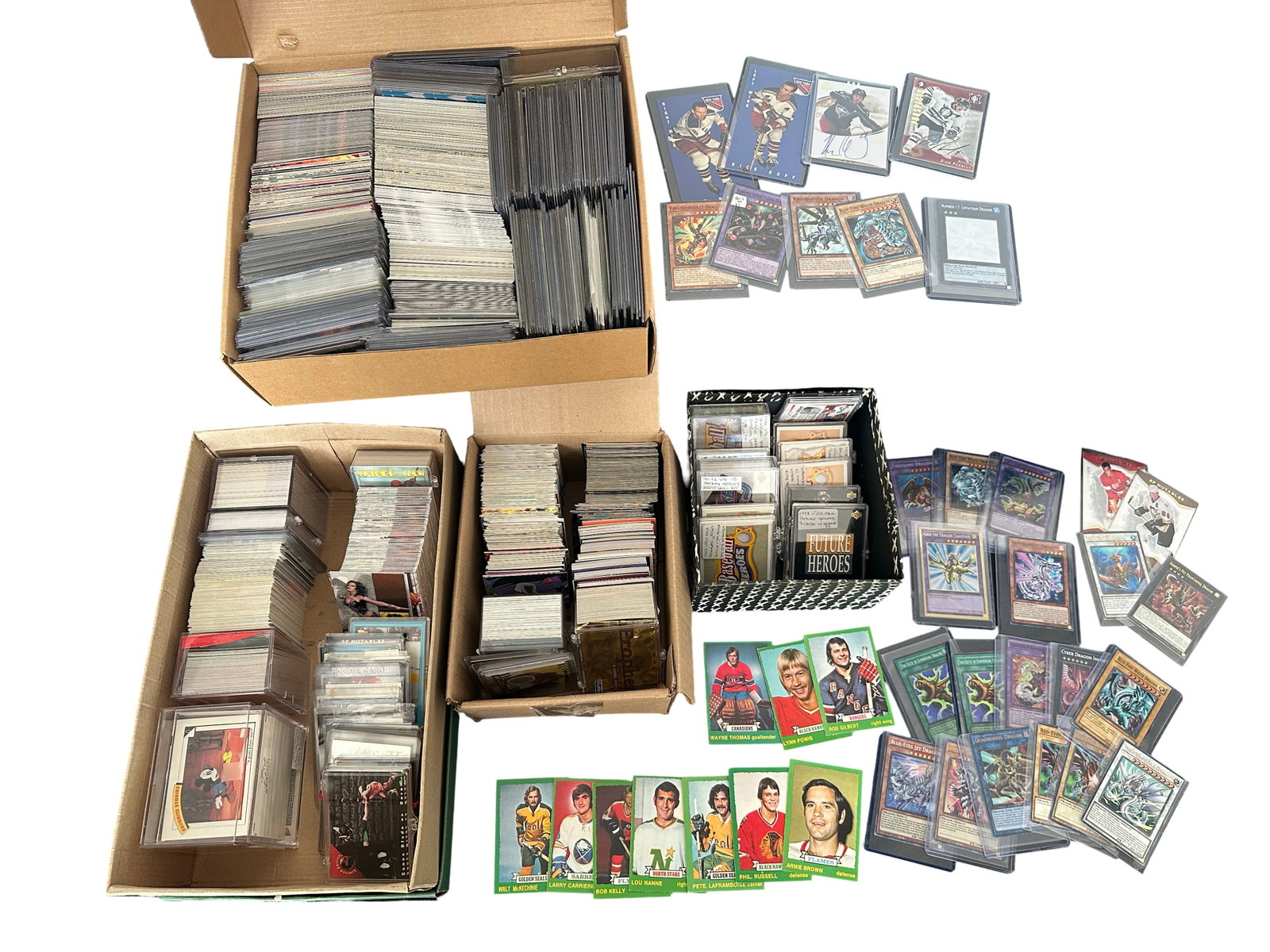 Massive Mixed Trading Card & Sticker Collection - Fleer Ultra Hockey Stars, Star Trek: The Next: An impressive, dealer-sized multi-category collection spanning sports and non-sport. From the photos I can confirm a long row dominated by early-to-mid-1990s Fleer Ultra Hockey (multiple stacks with U