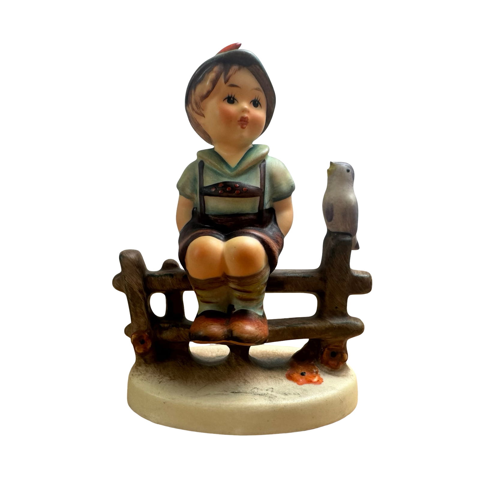 Charming Vintage Hummel Figurine “Wayside Harmony" #111 3/0 TMK-3 - West Germany: Presenting an enchanting Goebel Hummel figurine titled “Wayside Harmony,” model number #111 3/0, expertly hand-painted and crafted in West Germany. This adorable piece depicts a young boy perc